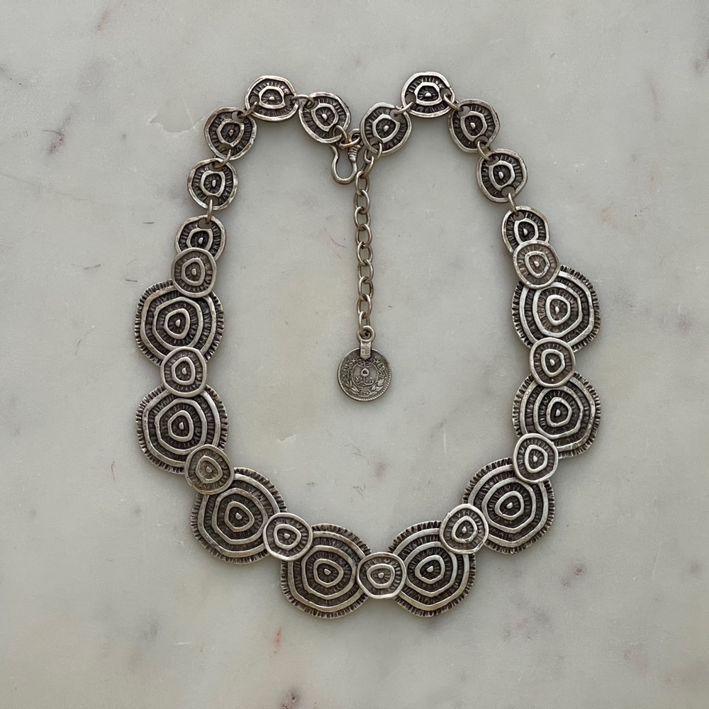 Silver plated spiral necklace.
